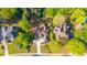 An aerial view shows the home's landscaping and driveway at 5685 Commons Ln, Alpharetta, GA 30005