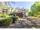 Expansive backyard features mature landscaping, a large deck, and a sprawling lawn at 5685 Commons Ln, Alpharetta, GA 30005