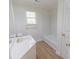 Bathroom with a shower and tub at 5685 Commons Ln, Alpharetta, GA 30005