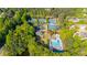 Aerial view of the community's tennis courts and swimming pool at 5685 Commons Ln, Alpharetta, GA 30005