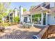 Enjoy outdoor dining on this spacious deck with beautiful views and outdoor seating at 5685 Commons Ln, Alpharetta, GA 30005