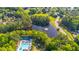 Aerial view of a pond with a fountain at 5685 Commons Ln, Alpharetta, GA 30005