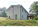 Rear view of house showing a partially finished basement and raised back deck at 101 Stroud Se Dr, Mableton, GA 30126