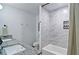 Bright bathroom featuring dual granite vanity, framed mirror, and soaking tub with marble-style tile surround and a convenient niche at 101 Stroud Se Dr, Mableton, GA 30126
