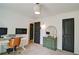 Well-lit bedroom featuring a dedicated office area and a view of the landscape at 101 Stroud Se Dr, Mableton, GA 30126