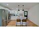 Modern kitchen featuring white cabinets, stainless steel appliances, and granite countertops at 101 Stroud Se Dr, Mableton, GA 30126