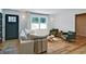 Bright living room with a comfortable white sofa, green armchairs, and a modern coffee table at 101 Stroud Se Dr, Mableton, GA 30126