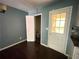 View from the kitchen into the bathroom with a toilet and vanity at 142 Davis Mill Ct, Lawrenceville, GA 30044