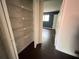 A shelved closet off the bedroom provides plenty of storage space at 142 Davis Mill Ct, Lawrenceville, GA 30044