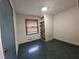 Bedroom featuring a built-in shelving unit, and linoleum tile flooring at 1517 Colony East Cir, Stone Mountain, GA 30083