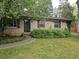 Charming brick home with a well-maintained front yard and walkway at 1517 Colony East Cir, Stone Mountain, GA 30083