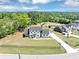 Aerial view of a stunning home showcasing the expansive front yard at 2577 Kilgore Rd, Buford, GA 30519