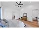 Cozy bedroom featuring wood floors and a vaulted ceiling at 2577 Kilgore Rd, Buford, GA 30519