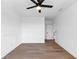 Bedroom with hardwood floors, a ceiling fan and lots of light at 2577 Kilgore Rd, Buford, GA 30519