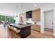 Modern kitchen featuring a large island, sleek cabinetry, and stainless steel appliances at 2577 Kilgore Rd, Buford, GA 30519