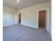Neutral bedroom features carpet flooring and two closets for ample storage at 5301 Tuscany Dr, Douglasville, GA 30135
