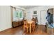 Cozy dining room features hardwood floors, natural light, and a wooden table with four chairs at 1590 Johnson Ne Rd, Atlanta, GA 30306