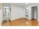 Bright hallway featuring hardwood floors with access to other rooms in the house at 1590 Johnson Ne Rd, Atlanta, GA 30306