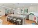 A bright kitchen with a large island including seating and stainless steel appliances at 1590 Johnson Ne Rd, Atlanta, GA 30306