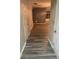 Spacious hallway featuring stylish, durable flooring that leads to the living areas at 2118 Burns View Ln, Lawrenceville, GA 30044