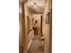Hallway with neutral colors and decorative lighting, creating a welcoming and stylish transition space at 2118 Burns View Ln, Lawrenceville, GA 30044