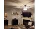 Inviting living room with a fireplace, modern decor, and ample natural light, perfect for relaxation at 2118 Burns View Ln, Lawrenceville, GA 30044