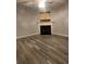 Inviting living room with stylish new floors and a cozy fireplace at 2118 Burns View Ln, Lawrenceville, GA 30044