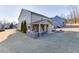 Aerial image of the backyard area with outdoor seating and a stone patio for entertaining at 2225 Independence Ln, Buford, GA 30519