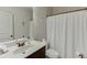 Bathroom featuring a vanity sink with a toilet and shower at 2225 Independence Ln, Buford, GA 30519