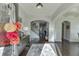 Elegant foyer with hardwood floors, decorative rug, and an open staircase leading to the upper level at 2225 Independence Ln, Buford, GA 30519