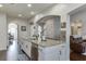 Bright kitchen featuring stainless steel appliances, granite countertops, and a spacious island at 2225 Independence Ln, Buford, GA 30519