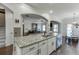 Spacious kitchen island with granite countertops and stainless steel appliances, great for entertaining at 2225 Independence Ln, Buford, GA 30519
