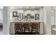 Modern kitchen featuring granite countertops, stainless steel appliances, and bar stool seating at 2225 Independence Ln, Buford, GA 30519