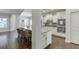 Modern kitchen with stainless steel appliances, double ovens, granite countertops, and breakfast bar at 2225 Independence Ln, Buford, GA 30519