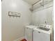 Bright laundry room with modern washer and dryer at 2225 Independence Ln, Buford, GA 30519