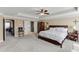 Large main bedroom with trey ceiling, walk-in closet, en suite bathroom, and sitting area at 2225 Independence Ln, Buford, GA 30519