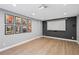 Finished basement area with a projector screen at 2740 Cezanne Ln, Cumming, GA 30041