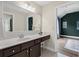 Spacious bathroom with large vanity, and view to the bedroom at 2740 Cezanne Ln, Cumming, GA 30041