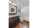 Stylish bathroom with a double vanity, granite countertops, and a shower/tub combination at 2740 Cezanne Ln, Cumming, GA 30041