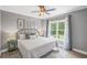 Cozy bedroom with a large window and hardwood floors at 2740 Cezanne Ln, Cumming, GA 30041