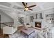 Inviting living room with a fireplace, coffered ceiling, and comfortable seating at 2740 Cezanne Ln, Cumming, GA 30041