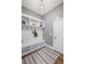 Well-organized mudroom with built-in bench, storage cubbies, and coat hooks for added convenience at 2740 Cezanne Ln, Cumming, GA 30041