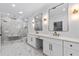 Bathroom featuring double vanity, modern finishes and a walk-in shower at 400 Auburn Rd, Auburn, GA 30011