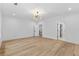 Bedroom features hardwood floors and access to ensuite bathroom and closet at 400 Auburn Rd, Auburn, GA 30011