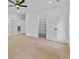 Bright bedroom with wood floors, closet, recessed lighting, and ceiling fan at 400 Auburn Rd, Auburn, GA 30011