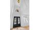 The front foyer features high ceilings, a hanging light fixture, and glass double doors at 400 Auburn Rd, Auburn, GA 30011