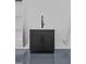 Close up of a black sink and cabinets located in the garage with epoxy flooring at 400 Auburn Rd, Auburn, GA 30011