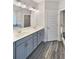 Bathroom features a double sink vanity with gray cabinetry and modern fixtures at 5331 Tuscany Dr, Douglasville, GA 30135