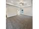 Large primary bedroom featuring carpet flooring, a ceiling fan, and natural light at 5331 Tuscany Dr, Douglasville, GA 30135