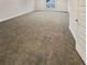 Spacious bedroom with plush carpeting and a large window for natural light at 5331 Tuscany Dr, Douglasville, GA 30135